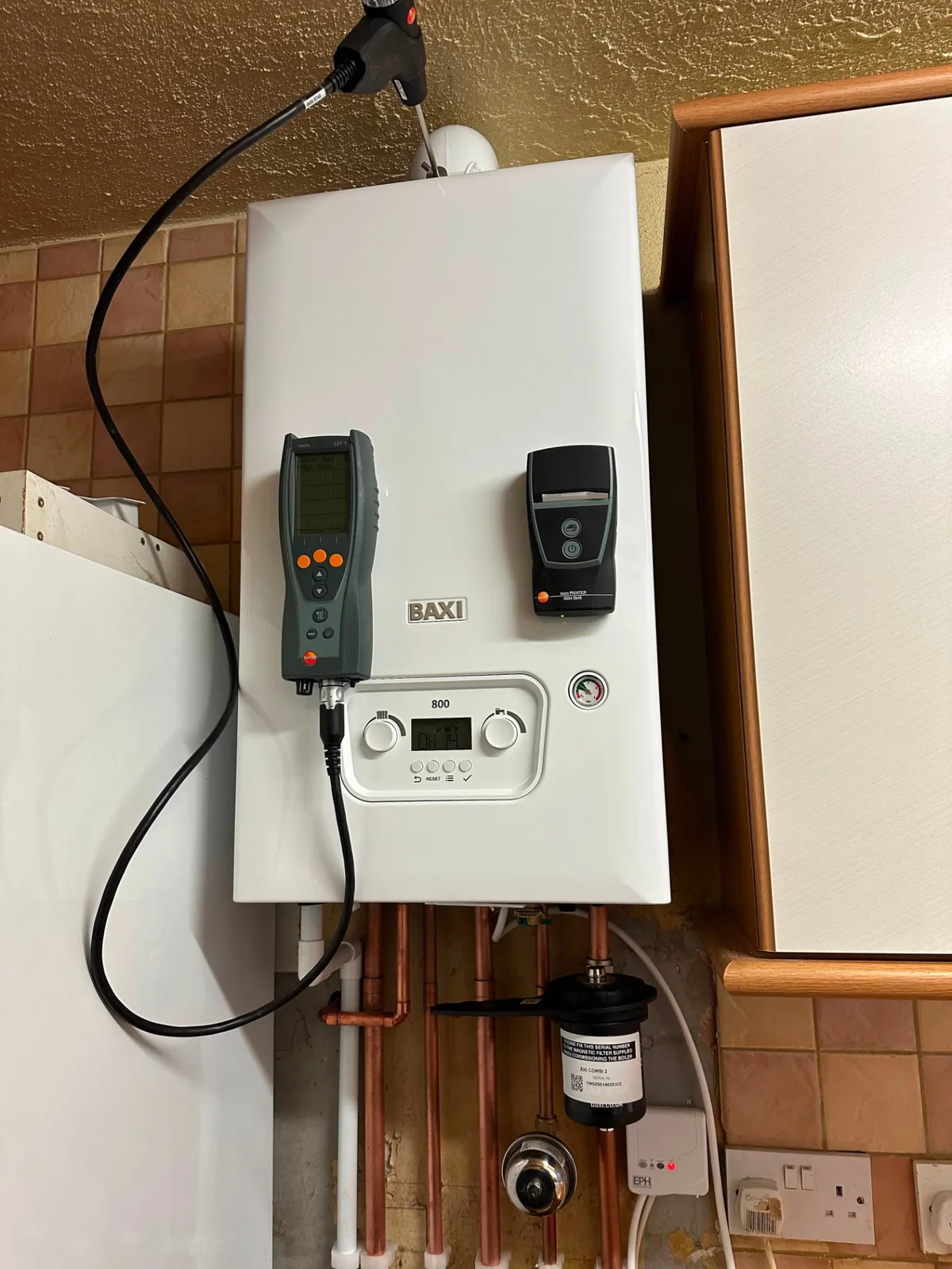 Annual boiler service on a Baxi 800 combi boiler with a digital flue gas analyser and printout