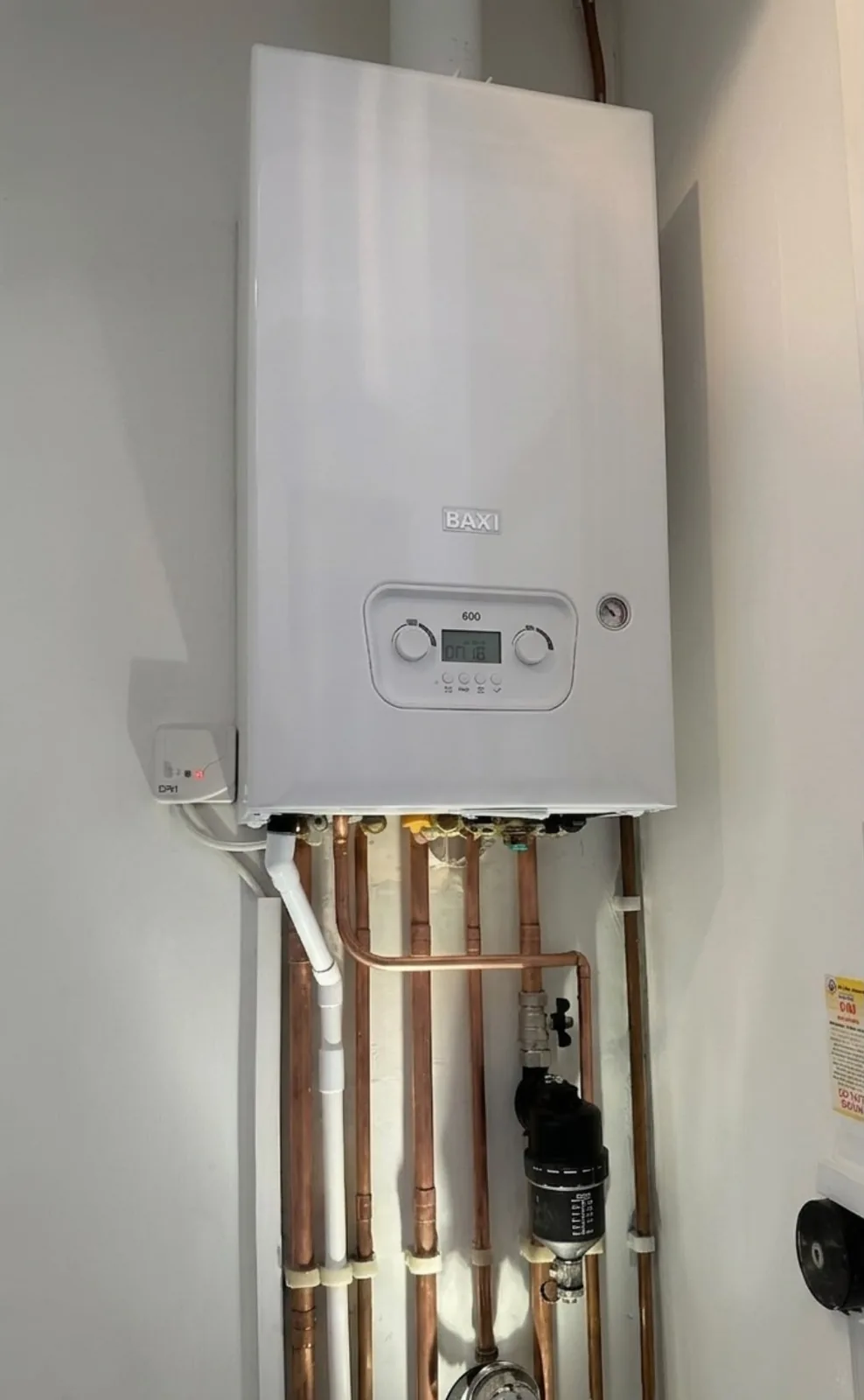 Baxi 600 combi boiler installation in Blackpool with tidy copper pipework and a magnetic system filter