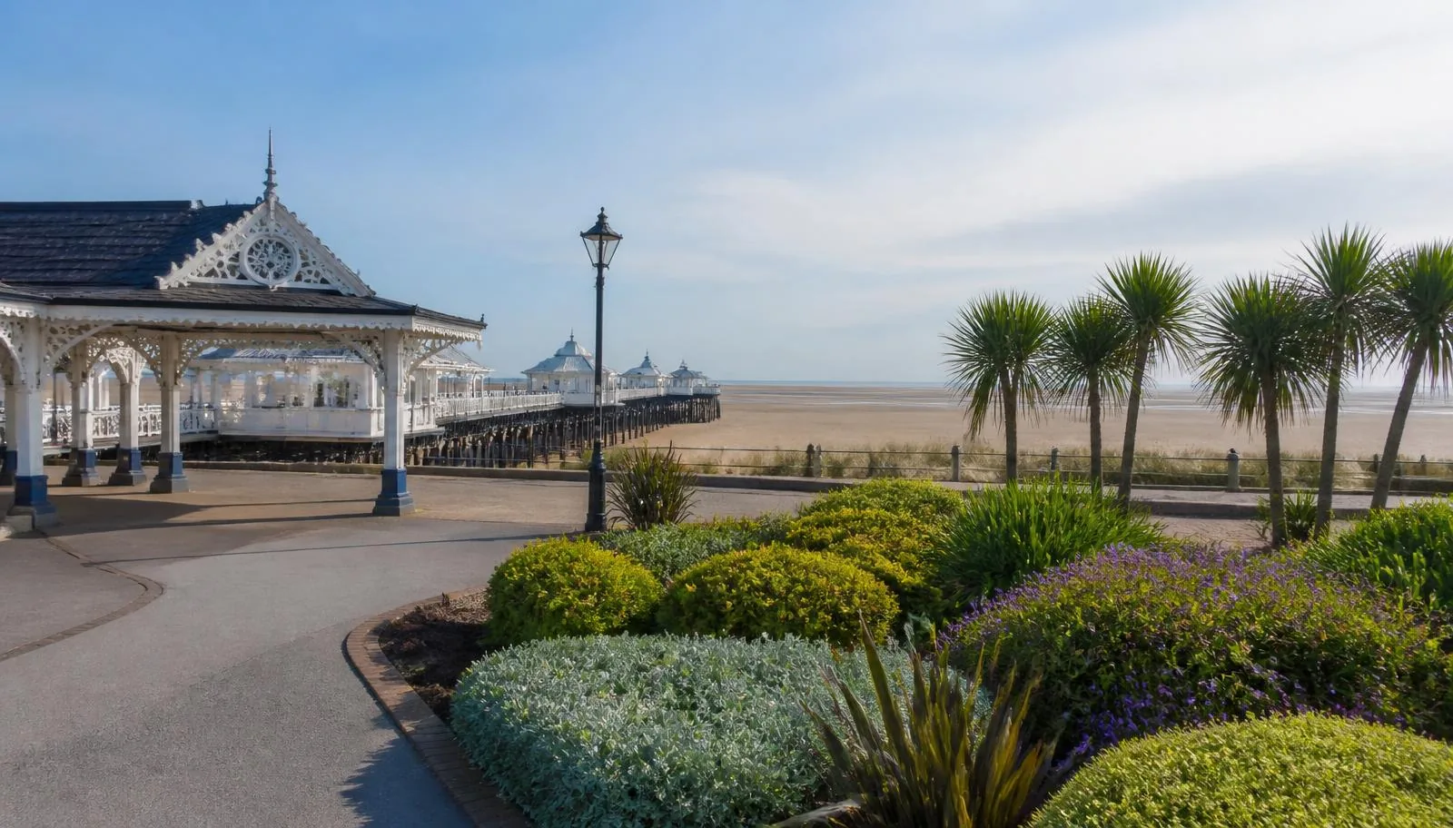 Seafront gardens, palms and the Victorian pier pavilion at St Annes on Sea